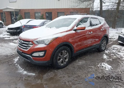 2015 Hyundai Santa Fe Sport 2.4L z USA, uszkodzony, nr VIN 5XYZUDLB8FG294511